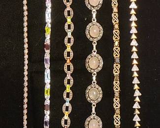 A small sample of the many Sterling bracelets in this sale. 
