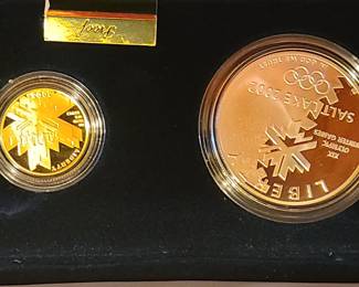 2002 Olympic coin set. One is Gold and the other is Silver 