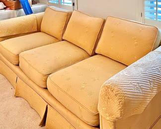Yellow upholstered sofa