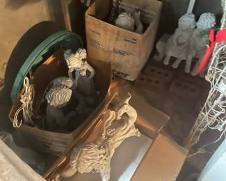 lots of lawn ornaments statues