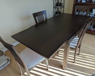 Square dinette slides open to rectangular