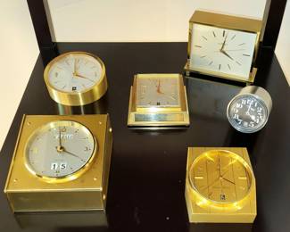 Remarkable collection of ca. 1950-70 Swiss electro-mechanical timepieces - all fully restored and in fine operating order - including a rare perpetual calendar (front left) $595, an iconic watch-shape  Zodiac "Corsair" with sweep seconds and calendar (front right) $395, a satin nickel case bullet  w black dial, sweep seconds and calendar (second row right) $395, a Relide w sweep seconds and calendar (center) $275, a Dunhill w sweep seconds and calendar (rear left) $275 and anAMF with sweep seconds (riear right) $275  