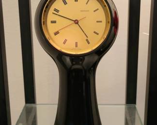 Model T1 Iconic Mid-Century Modern Secticon clock by Angelo Mangiarotti.   Swiss Precision Portescap electro-mechanical movement.  9.25" high, 4.75" globular head.   Fine original condition - professionally restored movement in perfect operating order.  $975

NOTE:  During the late 1950s acclaimed Italian architect and urban designer Angello Mangiarotti introduced the Secticon range of clocks.   T1 is the first model.  These clocks  feature innovative molded  plastic cases.  Portescap movements with precision escapements were manufactured for the Secticon line by Le Porte-Echappement Universal (Universal Escapements Ltd).   The Portescap movement is contained in a clear plastic housing.  It utilizes a D-cell battery to drive a small electric motor, which runs continuously at about 1000 rpm. By an ingenious arrangement, this motor drives the escapement; a unique type of remontoire lever beating half seconds. 
The clock will run for over a year before the battery is exhausted.