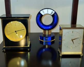 1960s - early 70s Swiss luxury timepieces with precision Portescap movements.  Black enamel merchandised by Turler. $545  Brass  with silvered dial sold by Garrard Jewelers to British Royalty.  $435     