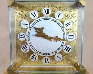 1960 Hour Lavigne (France) "JUST" Clock - hand engraved gilt-bronze and plate glass case. 8-day 11-jewel movement.  This handsome  timepiece has the rarely encountered distinction of limited/numbered production - handled solely by the best jewelers.  The back case carries an Hour Lavigne inscription specifying Gabriel Lucas as the recipient and the example (edition) as No. 12.  

Operating from the early 1960s through the 70s, Gabriel Lucas was a Montreal based high-end manufacturing jeweler.  Their prestigious cutting-edge designs reached  a worldwide clientele.  This clock was displayed in the jeweler's showroom.        

The clock has been maintained in superb original condition.  It displays impressively on a mantle, shelf, or desk.  Sole damage is a 0.75" long stress crack in the right side glass panel.  $560

5.5" high, 6.5" wide at base, 2" deep
weight 3.4 lbs! 