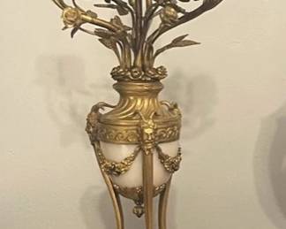 Gilt-bronze and Carrara marble urn form candelabra with satyr masks heading floral swags.   Naturalistic branch arms embellished with leaves and flowers.  Floriform nozzles and bobeche.