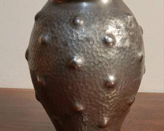 1930 ART DECO HANDWROUGHT PEWTER DINANDERIE "OUTERWORLDLY" VASE by RENE DELAVAN  $395   A remarkably innovative ovoid vase with abbreviated neck and everted rim.  Decorated overall with evenly spaced spherical blisters on a martele ground.  Incised "R. Delavan" at mid wall.  Base stamped with circular trademark of Delavan, Paris above "ETAIN D'ARTE."

The side-by-side depicted 6.5" high pewter trumpet vase with distinctive handles is another Rene Delavan work in my collection. 

Provenance:  Kelly Gallery, New York  see inventory image and gallery description

5.3" (13.6cm) high, 4.3" (11cm) wide at mid body