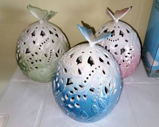 Ceramic egg and butterfly lanterns with battery operated candle