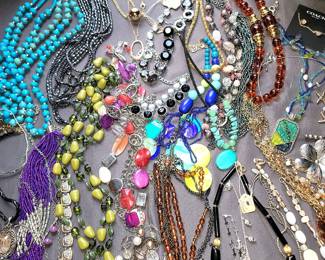 Hundreds of bracelets, necklaces, earrings (pierced and clip)