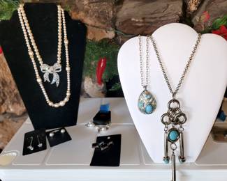 Hundreds of bracelets, necklaces, earrings (pierced and clip)