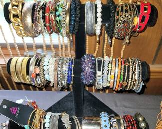 Hundreds of bracelets, necklaces, earrings (pierced and clip)