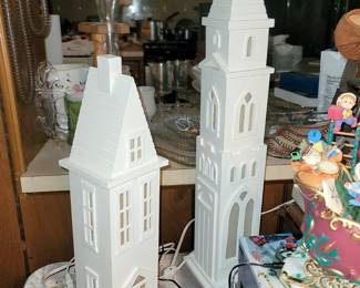 Tall white Department 56 lighted buildings