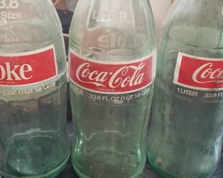 Coca Cola 33.5 oz green bottles