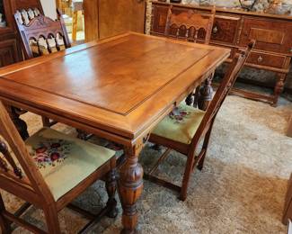 lovely 1940's dining room table with chairs and a buffet