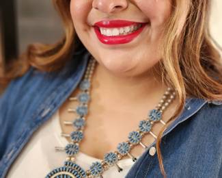 Petit stones of turquoise in this Squash Blossom necklace