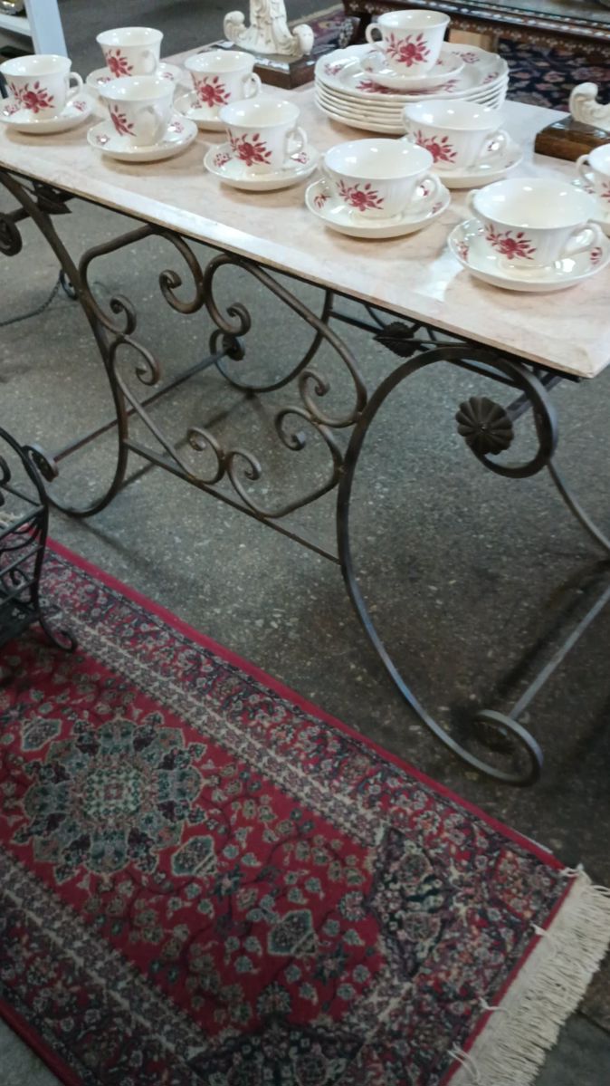 Wrought Iron Table with marble style top
Red and white china