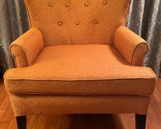 burnt orange MCM armchair