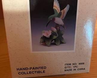 ruby throat hummingbird on flower box label