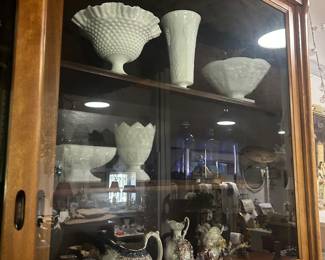 Antique high and low display with sliding doors