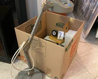 Work light with magnifying glass.