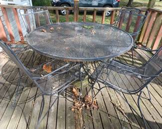 Wrought iron patio table and chairs