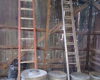 30 ft extension ladder, 12 ft ladder and trash cans