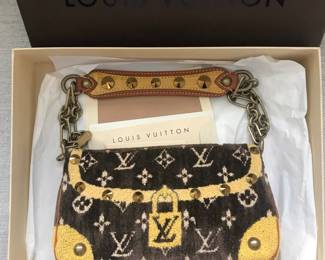 Louis Vuitton
Trompe L'oeil 
Velvet Monogram Pochette
$1600