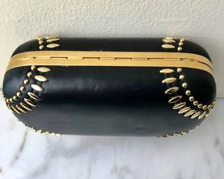 Detail 
Alexander McQueen
skull handbag 
leather & metal & crystal 
$900
