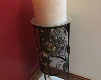 Large candle on stand
