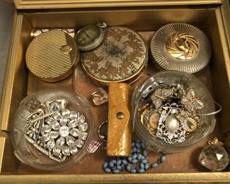 Vintage jewelry and makeup boxes