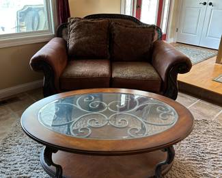 Loveseat, coffee table, plush area rug