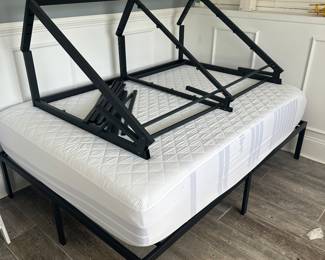 Two folding beds