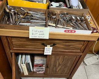 Rolling cutting board cabinet and lots of utensils