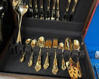 Gold flatware set w/ case