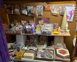 Two huge built-in sewing centers that are LOADED!