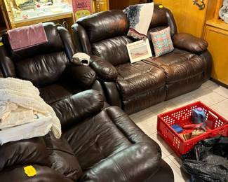 Leather motion love seat and two recliners
