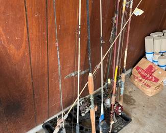 several fishing rods & reels