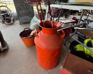 Antique milk can and pecan pickers