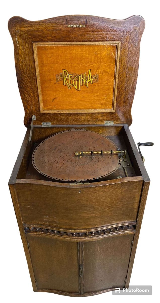 001 Antique Regina Music Box In Oak Cabinet with 26 Metal Discs