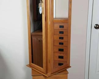 Mirrored, Tall Rotating Jewelry Cabinet