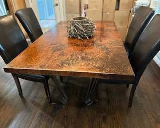 copper top table with chairs