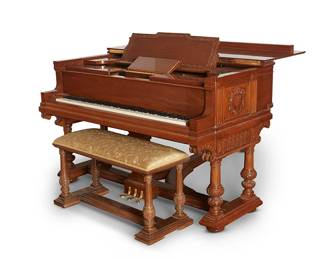 1017
Early/mid 20th century
A Steinway Aeolian Duo-Art Player Piano
Marked on interior with serial number: 4474 and 9 / 30.Q / Pat. Oct. 1902
With a varnished mahogany veneered case decorated with carved crests to each side, set upon three dual columnar supports, along with a conformingly designed piano bench en suite; compartment in the center of the fallboard opens to the music roll port and a panel at the front of the keyboard drops open to reveal player piano control panel
32.5" H x 58" W x 72" L
Estimate: $6,000 - $8,000