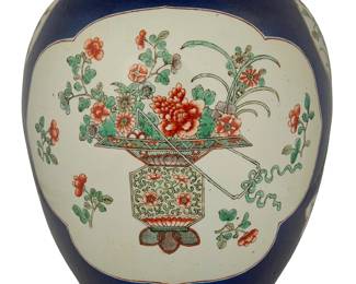 1022
Qing Dynasty 1644-1911 or later
A Chinese Kangxi-Style Enameled Porcelain Ginger Jar
Marked to the underside in blue enamel with a double ring
With large floral registers surrounded by cobalt ground
11.5" H x 9" Dia.
Estimate: $1,000 - $1,500