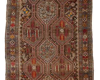 1020
20th century
A Shiraz Rug
The wool-on-wool foundation rug with polychrome repeating cartouches and geometric motifs on an umber ground
8' L x 5' 4" W
Estimate: $700 - $900