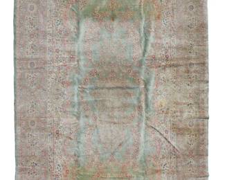 1021
Mid-20th century; Iran
A Persian Kerman Palace-Sized Rug
Wool on cotton foundation, with polychrome floral motifs in hues of pink on a light sea green field
19' 3" L x 12' W
Estimate: $1,000 - $2,000