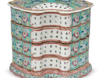 1025
20th century
A Chinese Enameled Porcelain Stacking Box
Marked to the underside in red enamel bearing an apocryphal reign mark for Qianlong Dynasty (1736-95)
The lozenge-shaped ceramic box with four fitted layers beneath the lid and above the base and all-over Famille Rose enameled decoration of foliate and avian motifs
8" H x 8" W x 5.5" D
Estimate: $600 - $800