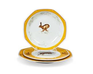 1033
Late 20th century; Paris, France
An Hermes "Chiens Courants Et Chiens D'Arret" Part Dinner Service
Each marked for Hermes / Paris / France; each further marked with pattern name and breed
The porcelain service comprising 18 dinner plates (10" Dia.), 9 salad plates (8.25" Dia.), and 8 soup bowls (8" Dia.) each centering depictions of various hunting breeds of dogs including Airedale Terrier, German Shorthaired Pointer, Labrador Retriever, Scottish Terrier, English Setter, Sealyham Terrier, Gordon Setter, Cocker Spaniel, Jack Russell Terrier, and Beagle, all with surrounding yellow rims and depictions of various hunted prey, 34 pieces
Estimate: $1,000 - $1,500