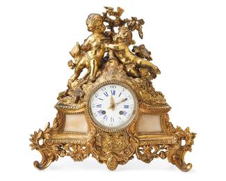 1035
Late 19th century
A French Gilt-Metal And Bronze Mantel Clock
Movement signed: Roblin a Paris
The white enameled dial with blue Roman numeral hour markers, black Arabic numeral outer minute track, and two train movement under a glass bezel and set in a gilt-bronze case surmounted by two putti drinking wine, cream stone panels flanking the dial, and scrolled foliate trim
14.5" H x 14.5" W x 4.25" D
Estimate: $400 - $600