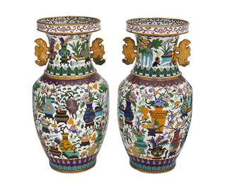 1037
20th century
A Pair Of Chinese Cloisonné Enamel Vases
Each enamel cloisonne vessel with all-over floral design on a white ground, 2 pieces
Each: 17.75" H x 9" Dia.
Estimate: $600 - $900