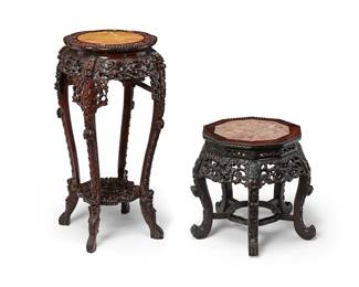 1068
20th century
Two Chinese Carved Wood And Marble Side Tables
Each appears unmarked
Comprising one smaller and one taller table, each with pink marble top inset into elaborately carved hardwood four-legged bases, 2 pieces
Larger: 37" H x 22" Dia.; smaller: 20" H x 17.5" Dia.
Estimate: $600 - $900